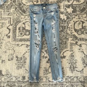 000 low rise distressed jeans